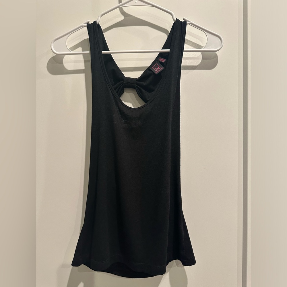 Material Girl with back cut outs. Size Medium. Never worn
